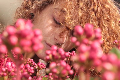 Woman with pink flowers