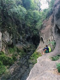 Woman standing on rock formation