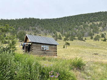 House on field against sky