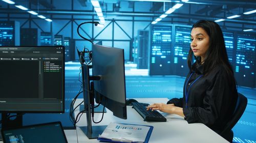 Portrait of young businesswoman working at office