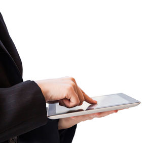 Midsection of man using smart phone against white background