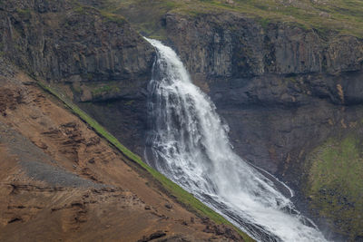 Waterfall in northeastern iceland not far from rjukandafoss in summertime