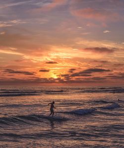 Scenic view of sea against sky during sunset