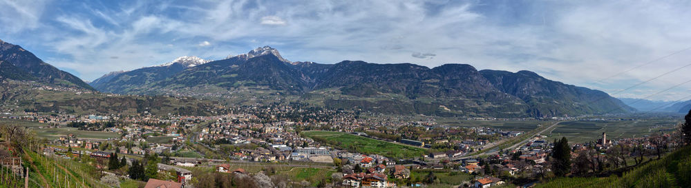 High angle view of town against cloudy sky