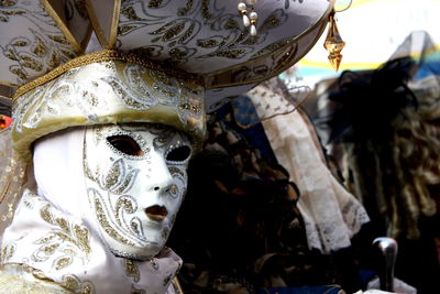 Person in mask and costume during venice carnival
