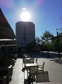 Buildings against sky on sunny day