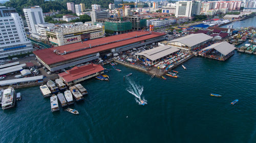 High angle view of cityscape by sea