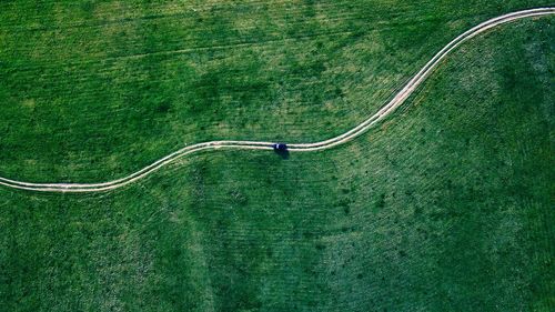 High angle view of road on field