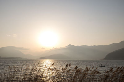 Scenic view of sea at sunset