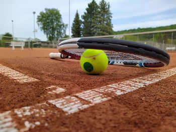 Close-up of tennis ball on field