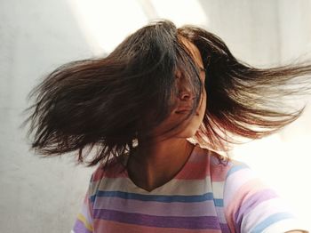 Close-up portrait of a girl at home