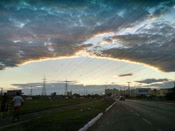 Road against cloudy sky