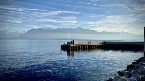 Pier on sea against sky