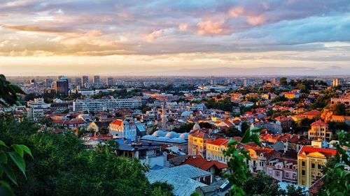High angle view of cityscape against sky during sunset