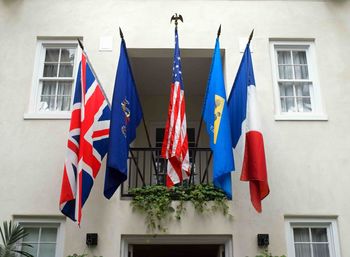 Low angle view of building flags