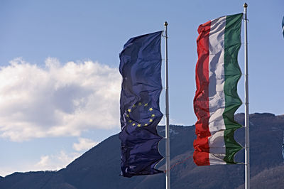 Low angle view of flag against sky