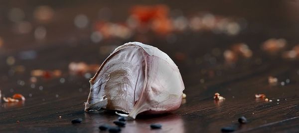 Close-up of garlic on table