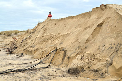 Low angle view of lighthouse against sky