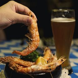 Close-up of hand holding drink