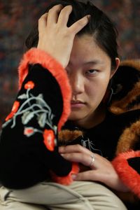 Close-up portrait of serious young woman