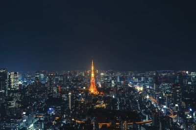 Aerial view of illuminated cityscape at night