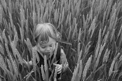 Girl looking at plants