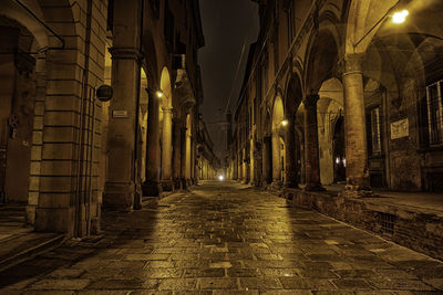 Illuminated street lights at night