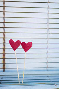 Close-up of heart shape decoration on wall