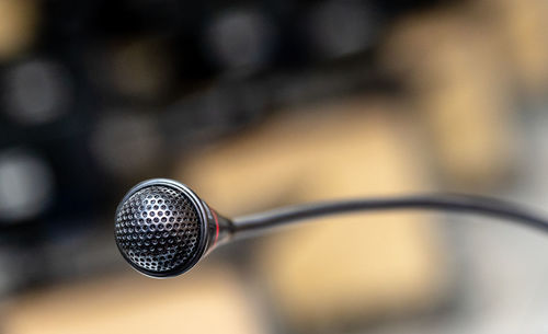 Close-up of eyeglasses on cable