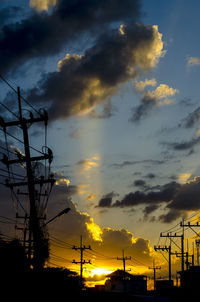 Low angle view of cloudy sky at sunset