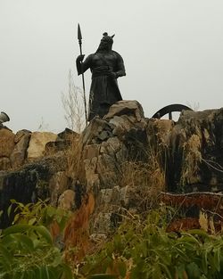 Low angle view of statue against clear sky