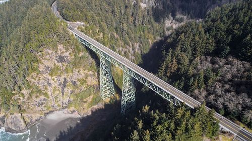 High angle view of road by mountain against sky