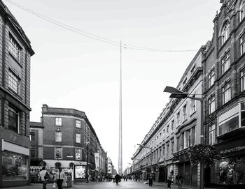 Street in city against clear sky