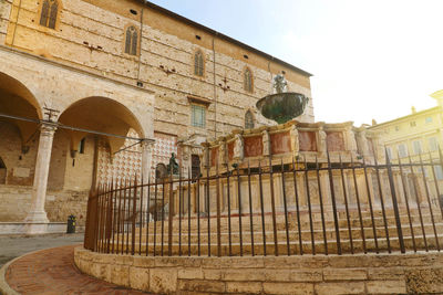 Low angle view of old building against sky