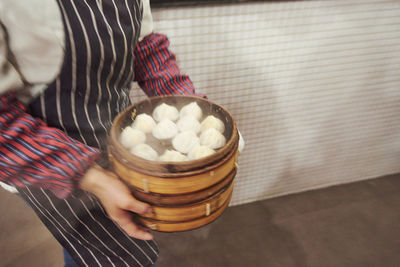 Close-up of hand holding ice cream