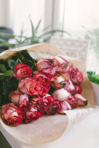 Close-up of roses on table
