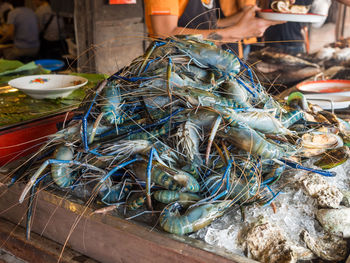 View of blue prawns for sale at amphawa floating market, thailand