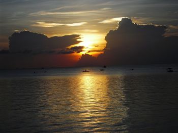 Scenic view of sea at sunset