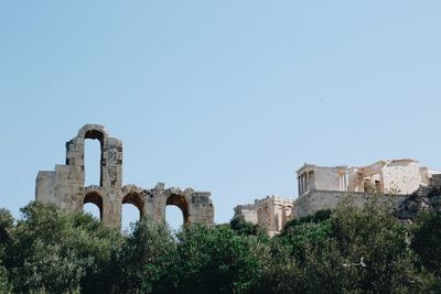 Low angle view of antique  architecture against clear sky