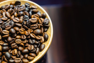 Close-up of coffee beans on table