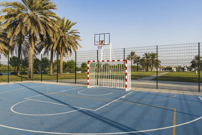 Scenic view of basketball hoop against clear blue sky