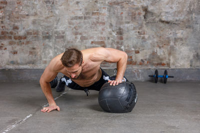 Man exercising in gym