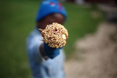 Man showing sweet food