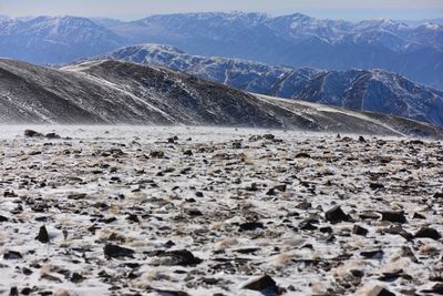 Scenic view of rocky mountains during sunny day