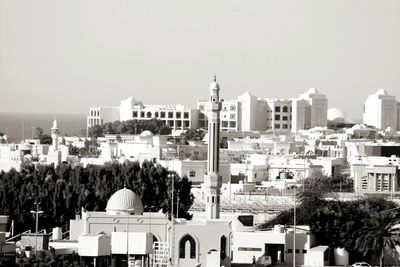 High angle view of buildings against clear sky