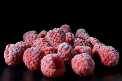 Close-up of pineapple against black background