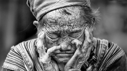 Close-up portrait of man wearing mask