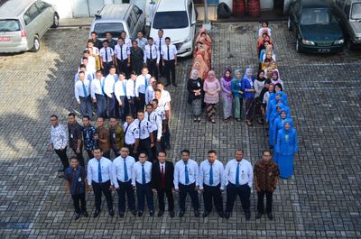 High angle view of people standing on street