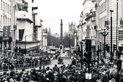 People walking on street in city