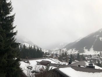 Scenic view of mountains against sky during winter